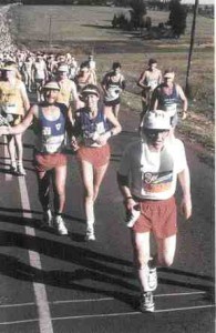 Haas (in white cap) runs in the Comrades Ultramarathon in South Africa.