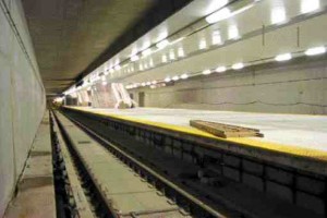 Subway rail line and platform; the station is constructed as a reinforced concrete box with long clear spans.