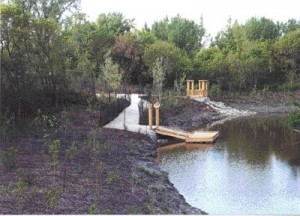 Restored riverbank with new lookout and landscape erosion protection.