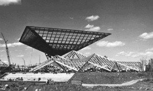 Construction photograph of Katimavik, Canadian Government Pavilion at Expo 67 in Montreal, one of many fine archival photographs in the book. "For a few tense moments all had nightmare images of the structure slowly turning inside out as the towers came down."