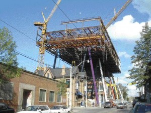 The "flying rectangle" at the Ontario College of Art and Design looms over McCaul Street as construction got under way this summer.