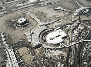 New parking garage at Pearson International Airport in Toronto dwarfs the old Terminal 1, due to demolished, at left of picture.