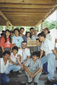 Manz (centre) with students in Indonesia celebrating construction of a concrete filter.