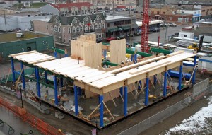 Wood Innovation and Design Centre under construction in downtown Prince George, B.C. The photograph shows the building under construction, with the double-height main floor and core shaft. Photo courtesy WoodWORKS! BC.